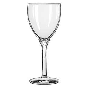A clear 13oz Domaine glass filled with water, placed elegantly on a white linen wedding table with floral arrangements in the background.