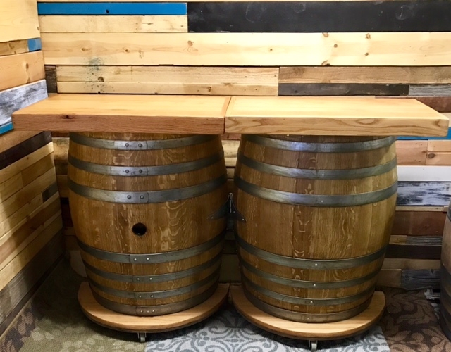 WINE BARREL BAR Bar – Wine Barrel 5′ featuring two and a half wine barrels, a 5-foot top, and four rear shelves, available for rentals in Las Vegas.